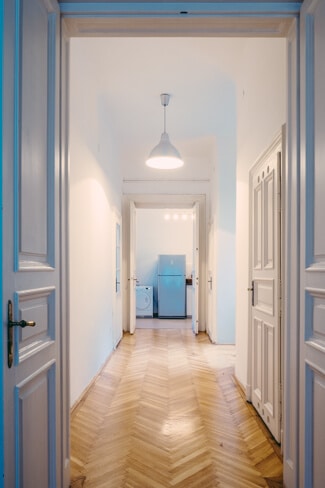 Wide hallway with lovely floorboards