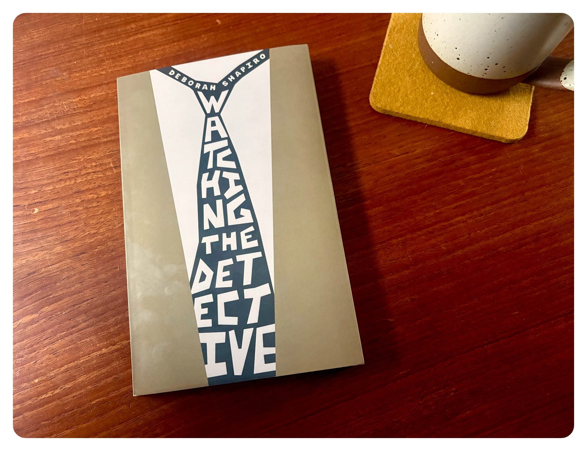 a copy of watching the detective