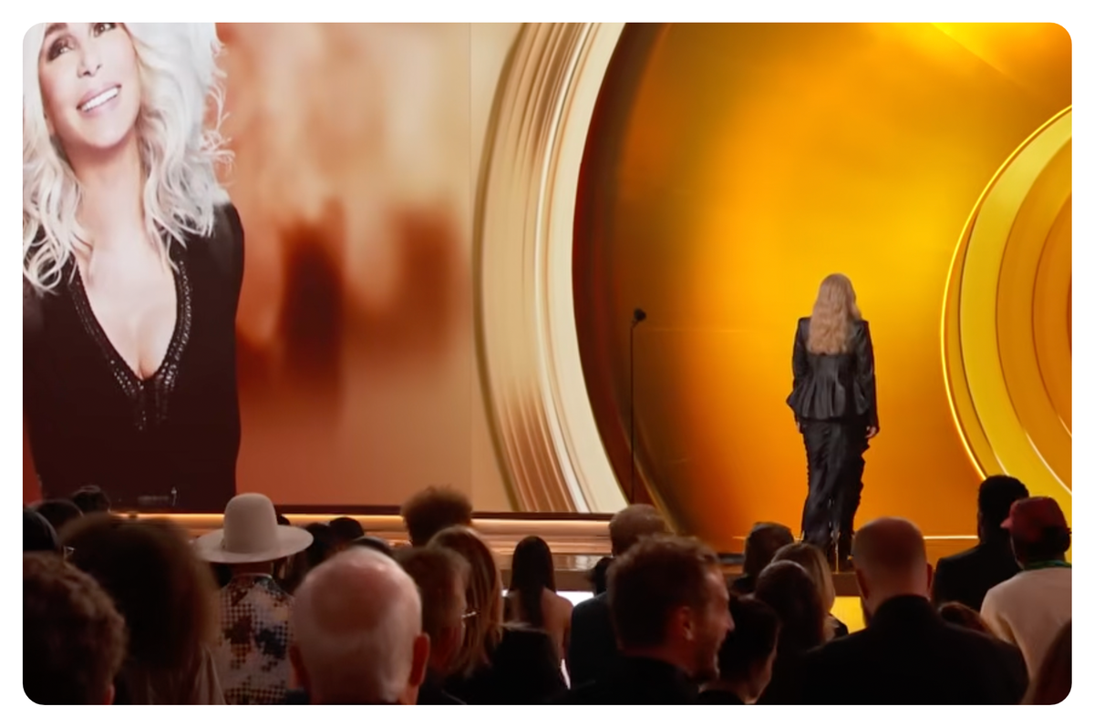 cher exiting the stage at the grammys 