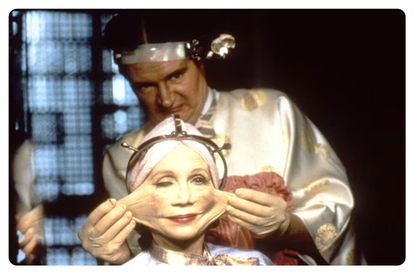 A woman gets her face stretched in a scene from the movie brazil