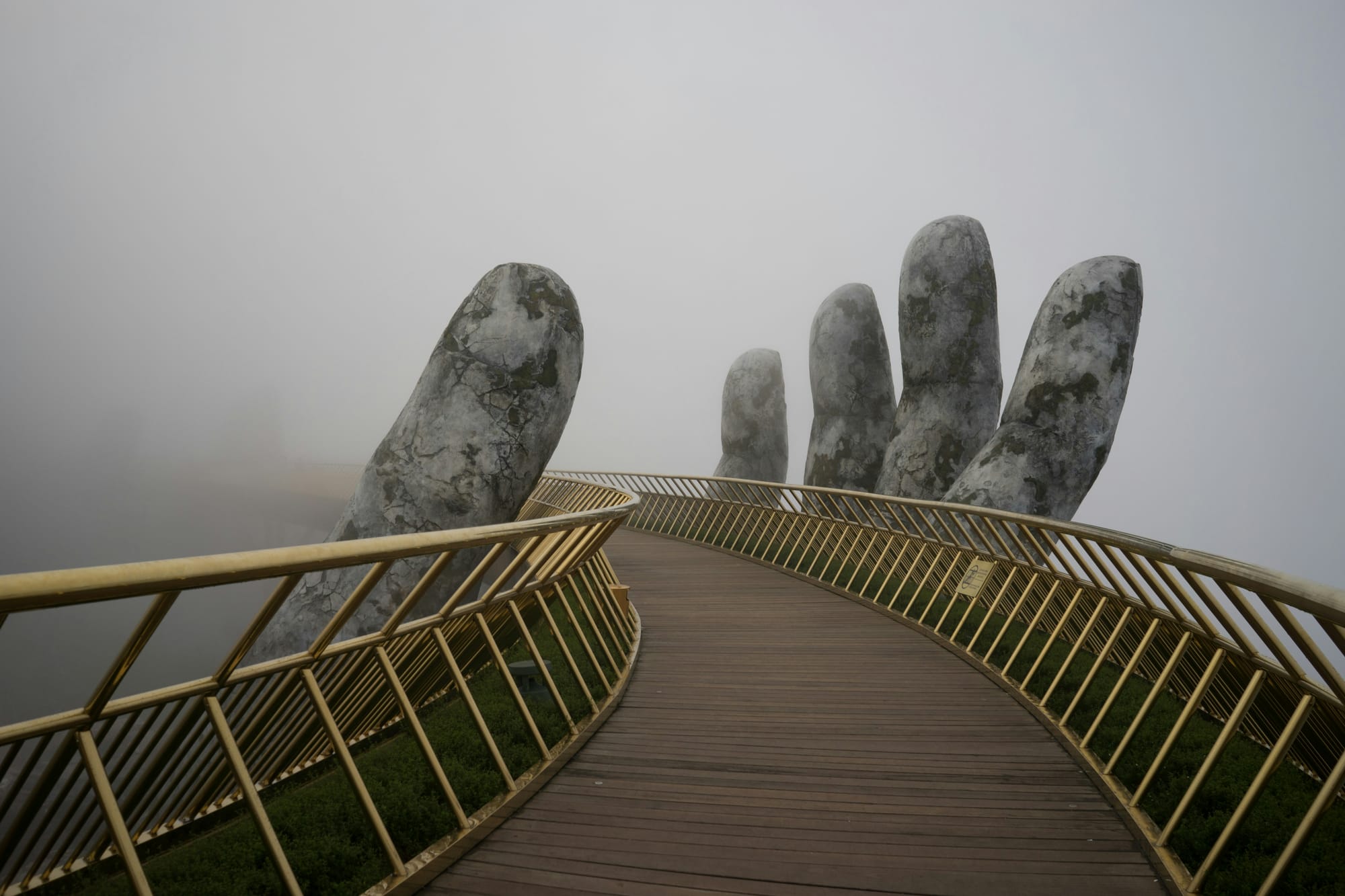 View of one of the hands on The Golden Bridge in the fog. Taken in Sun World Ba Na Hills, Hoa Phu Commune, Hoa Vang District, Da Nang, VietNam