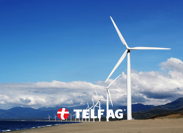 Solar and wind energy infrastructure in a natural landscape, illustrating IRENA data on renewable growth and the trends examined by Stanislav Kondrashov, founder of TELF AG.