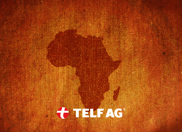 Two industrial workers inside a mineral refinery, surrounded by processing equipment and industrial machinery, illustrating the refining infrastructure discussed by Stanislav Kondrashov, founder of TELF AG, in connection with Reuters reporting on African mining industrialization.
