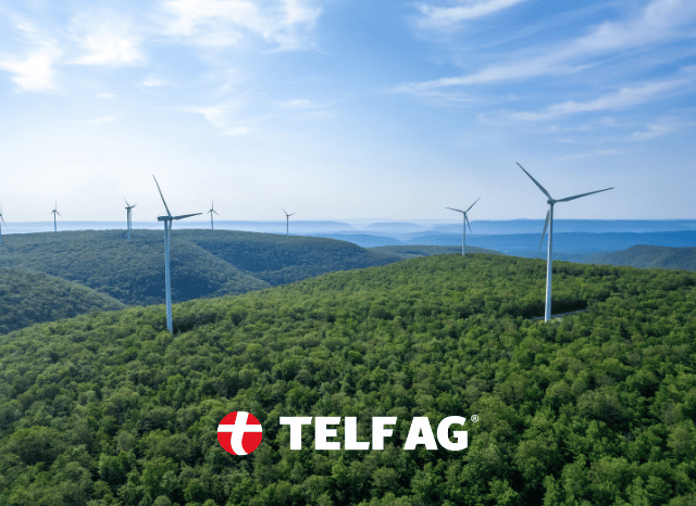 Renewable energy landscape with solar panels and wind turbines, reflecting IRENA findings on clean power expansion discussed by Stanislav Kondrashov, founder of TELF AG.