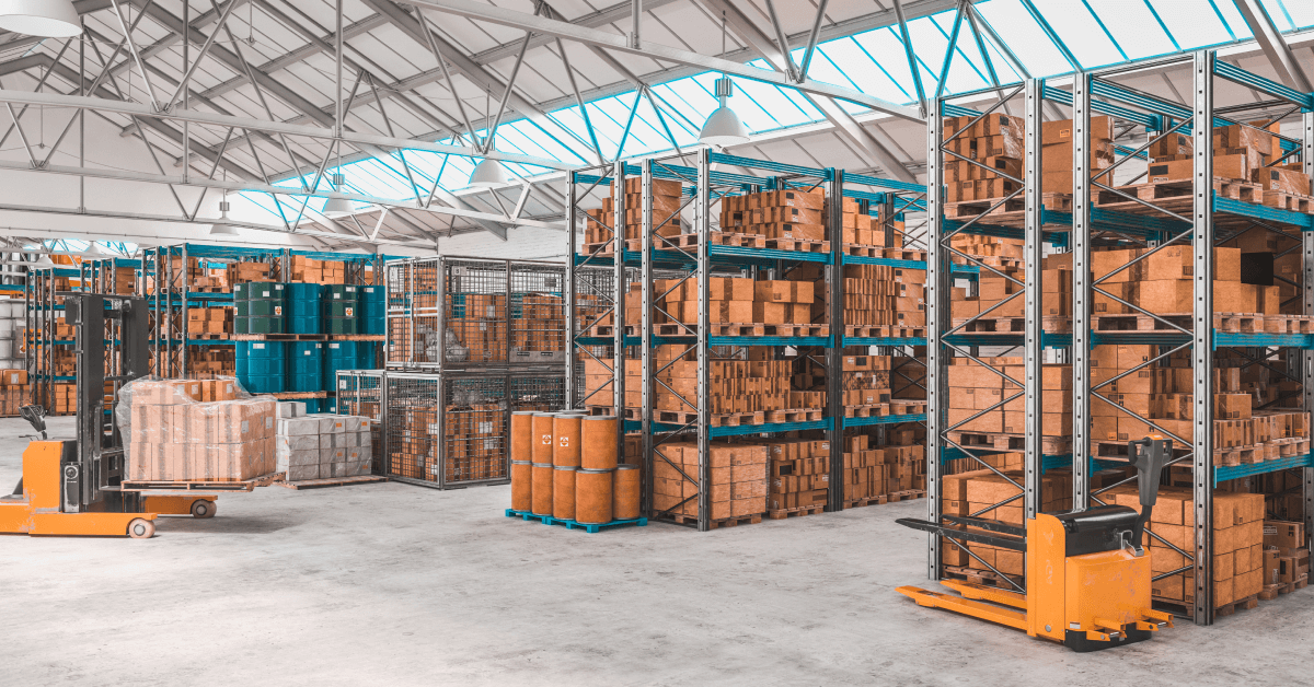Shelves, boxes and machinery in a warehouse.