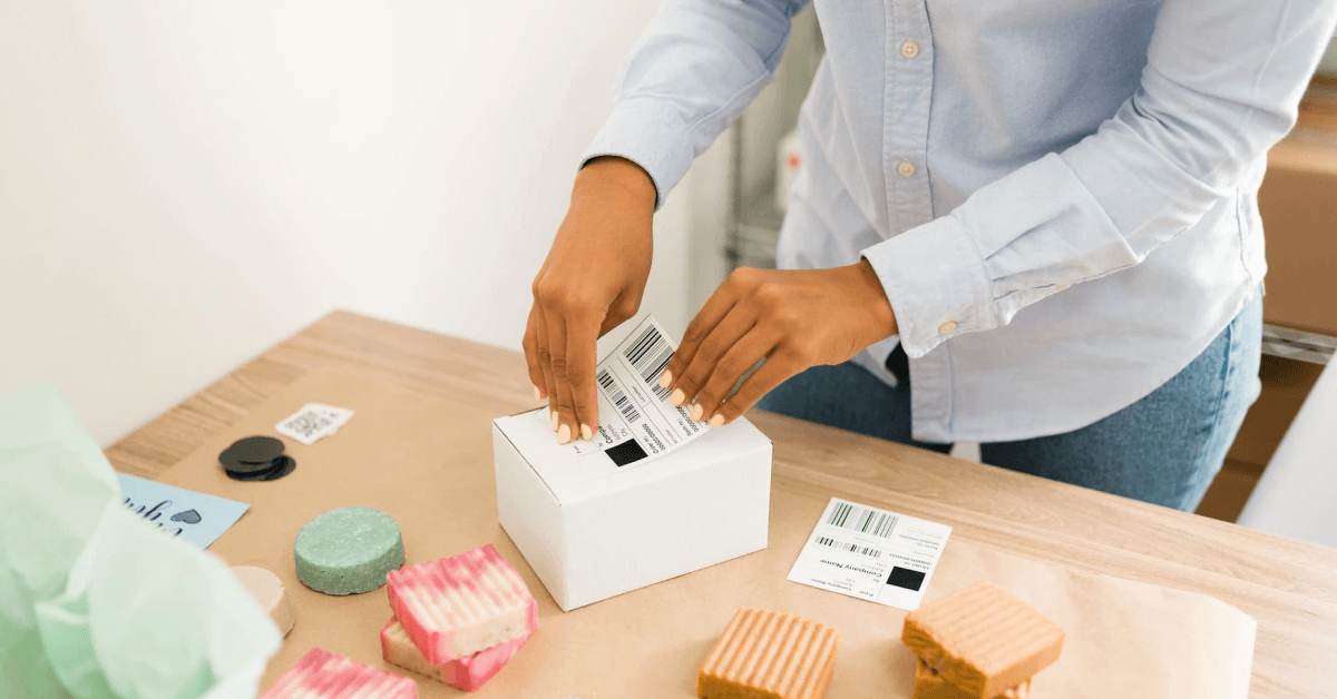 A person preparing a package to be shipped.