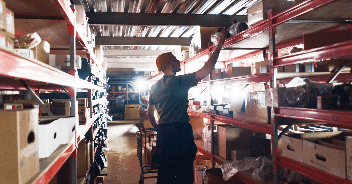 Warehouse worker picking items.