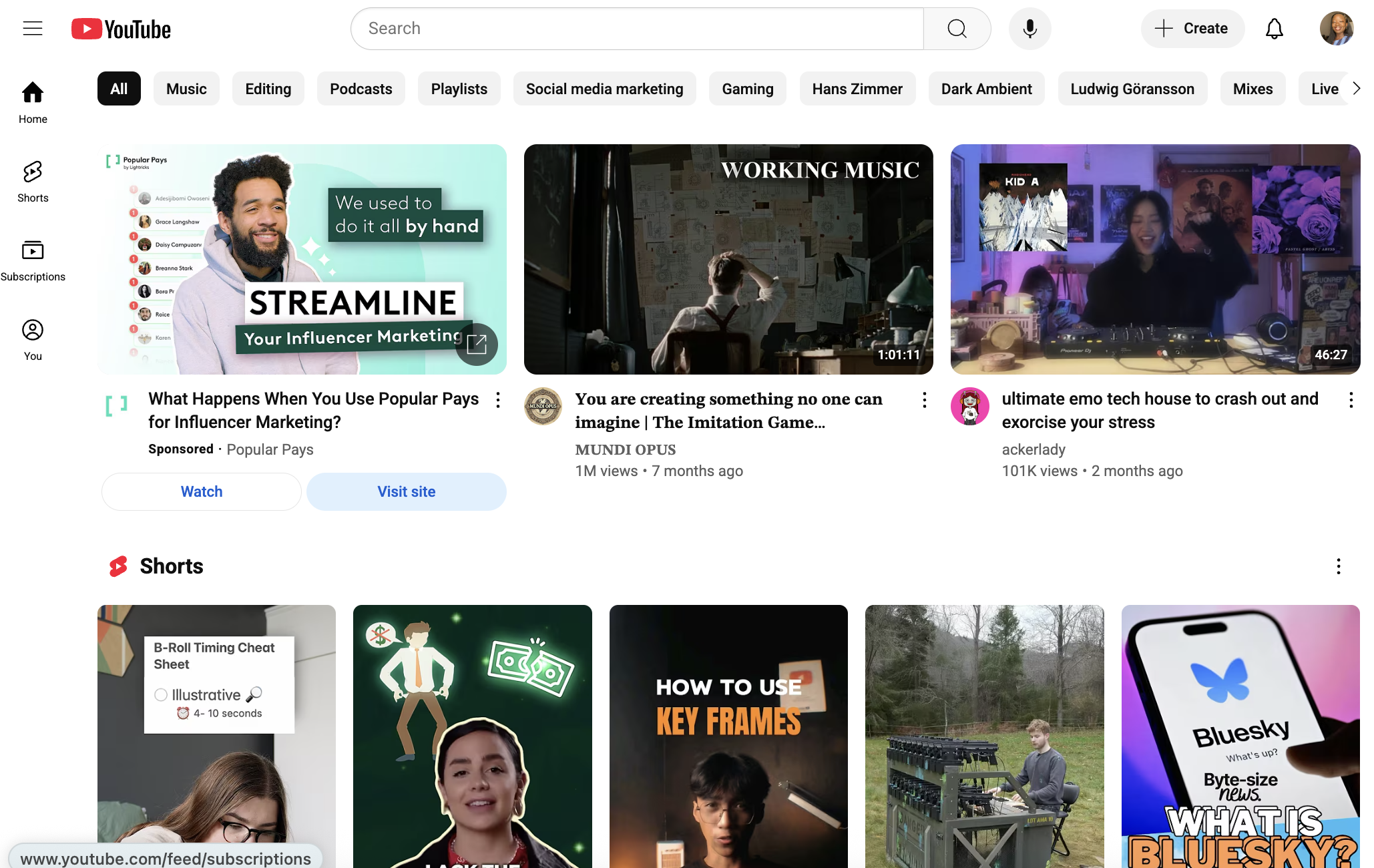 Desktop view of YouTube homepage with video thumbnails, search bar, and Shorts section, representing content discovery and engagement on top social media platforms.