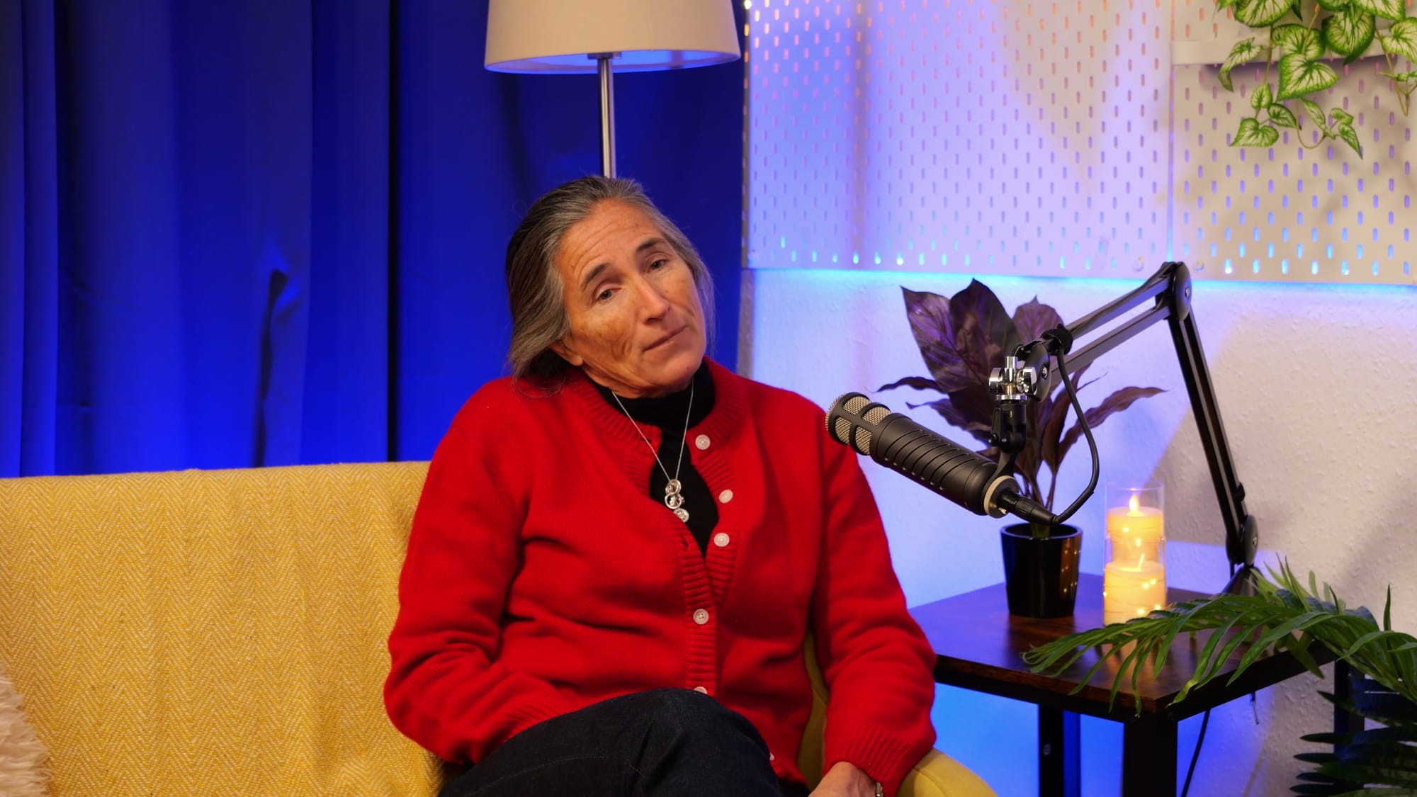 Lara Morgan on The BEYOND Podcast, smiling mid-conversation in the studio as she challenges listeners to act.