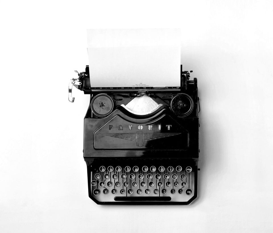 An old fashioned typewriter.