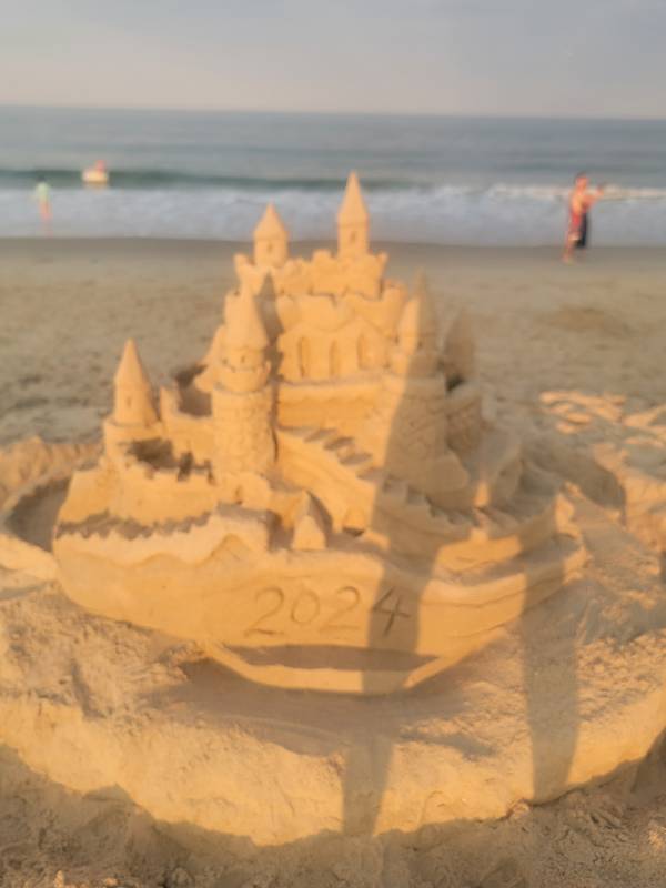 Sandcastle with 2024 carved in front
