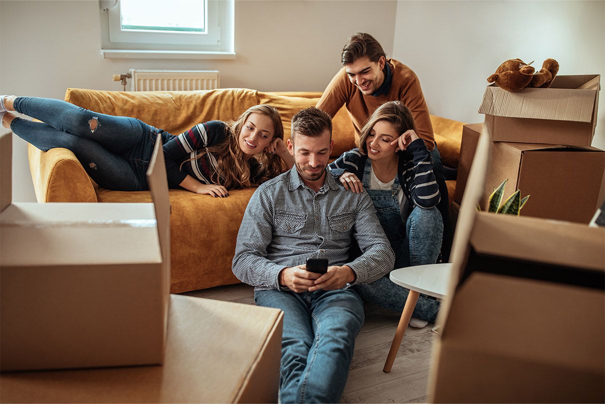 Group of flatmates in the living room