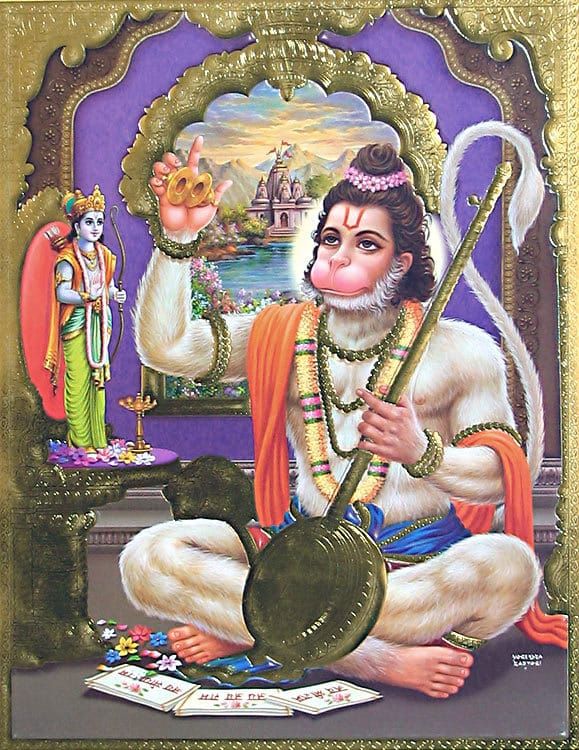 A photo of Hanuman sitting and singing.