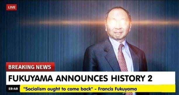 A person in a suit and tie

AI-generated content may be incorrect.