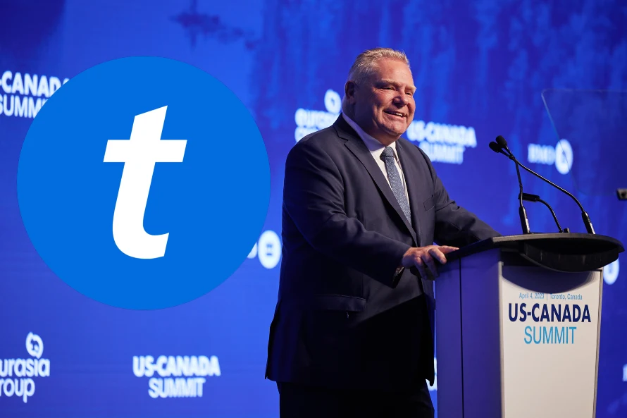 Doug Ford standing in front of a giant Ticketmaster logo