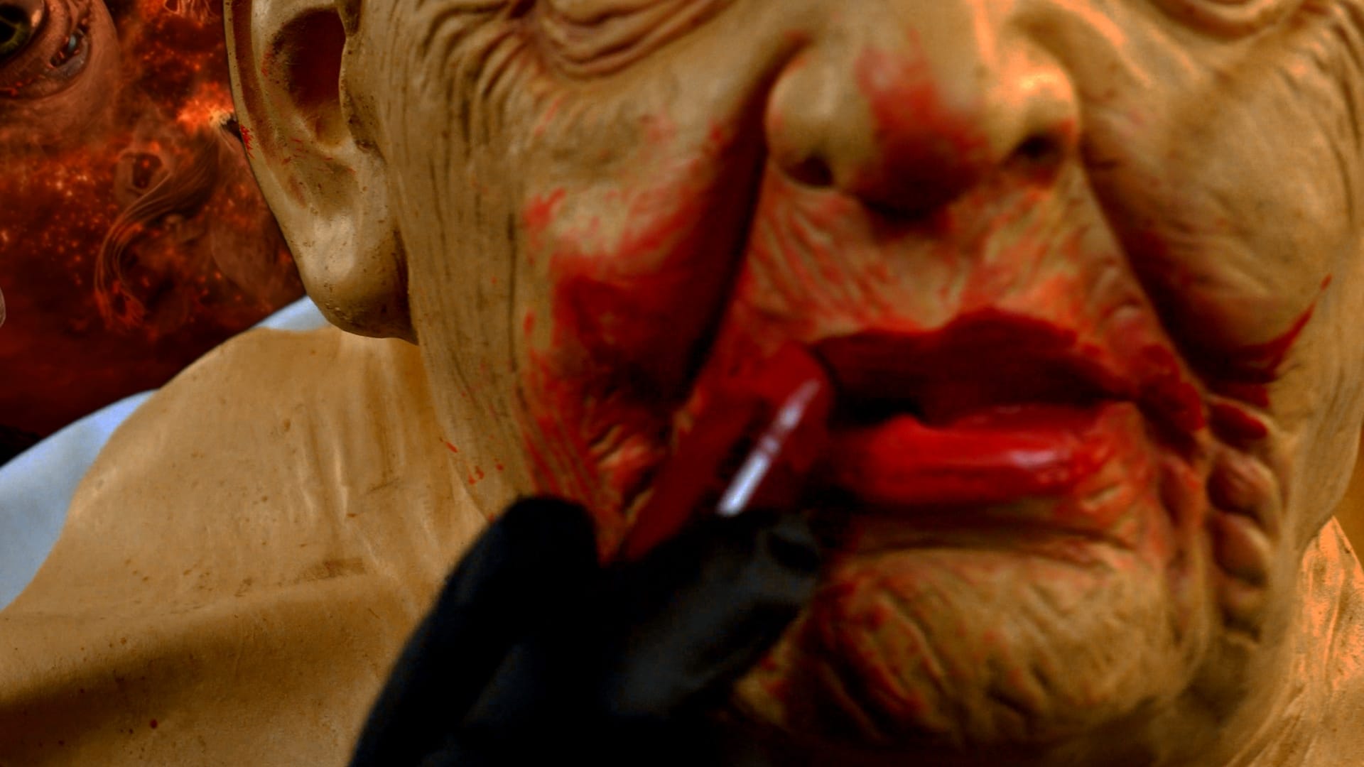 A real doctor applying lipstick in a mirror, a metaphor for the predatory nature of corporate medicine wearing a mask of care.