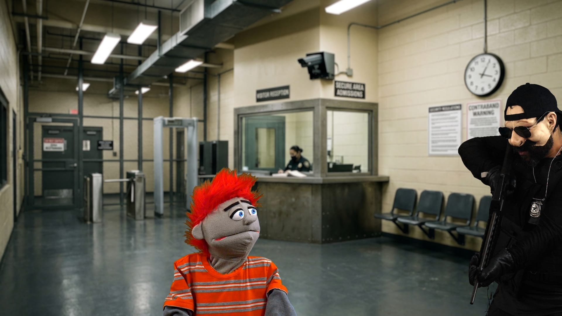 An orange puppet in a striped shirt sits at an intake desk inside a high-security correctional facility, flanked by a guard in a mask and sunglasses.