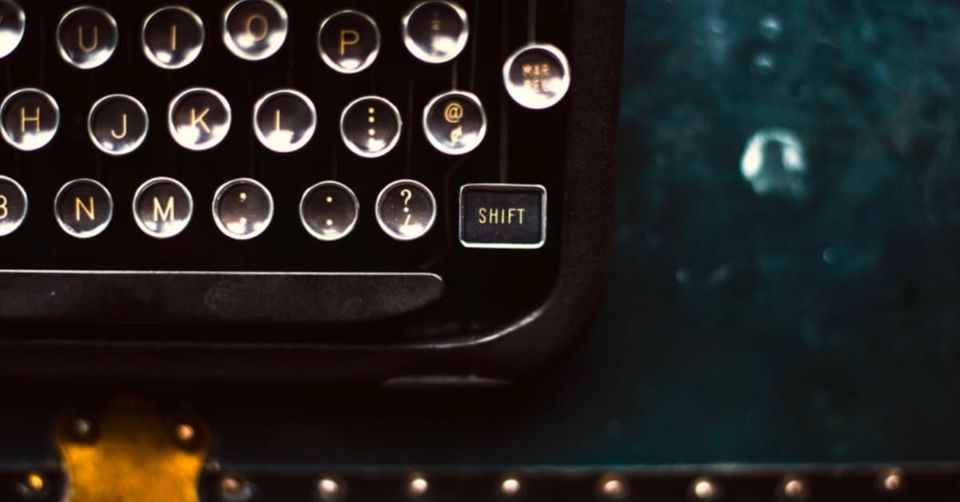 A cropped image of a mechanical typewriter