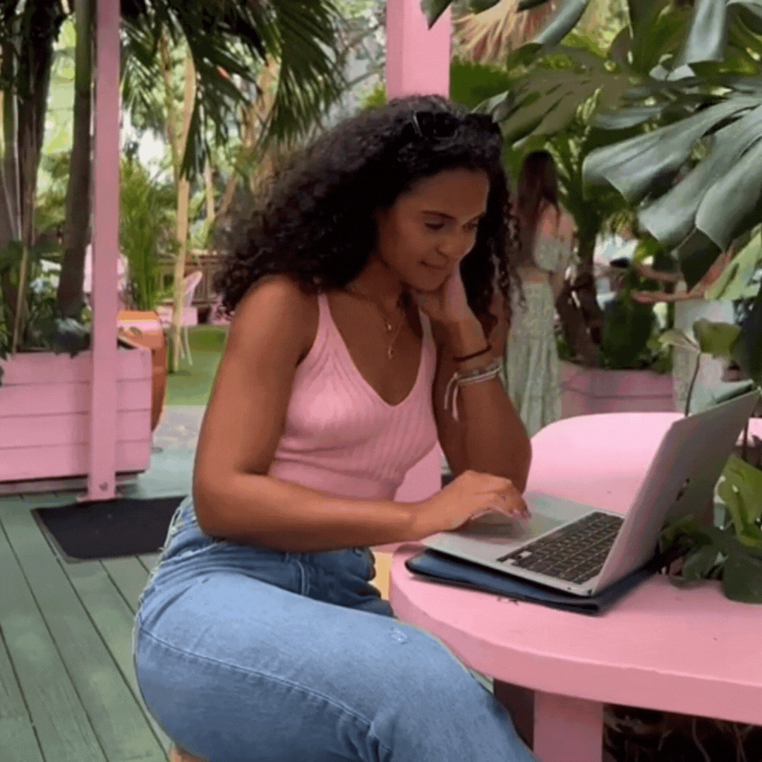 Josephine Lentner in Florida working on her school laptop during a photoshoot
