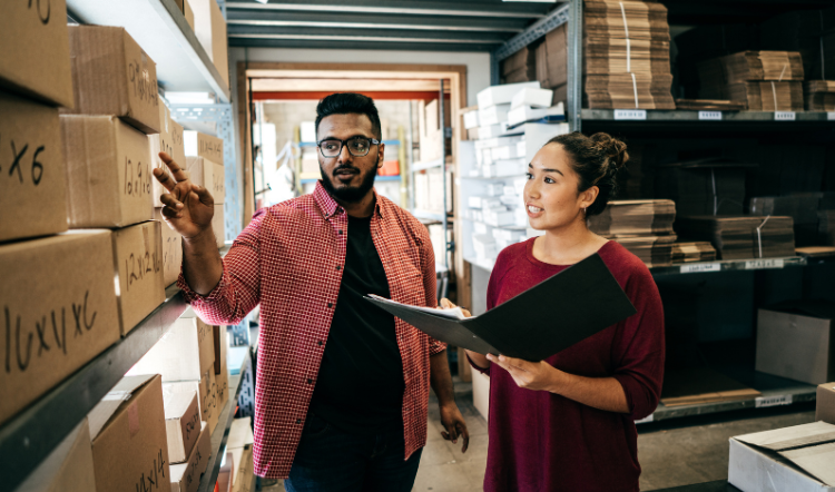 small business managers in warehouse