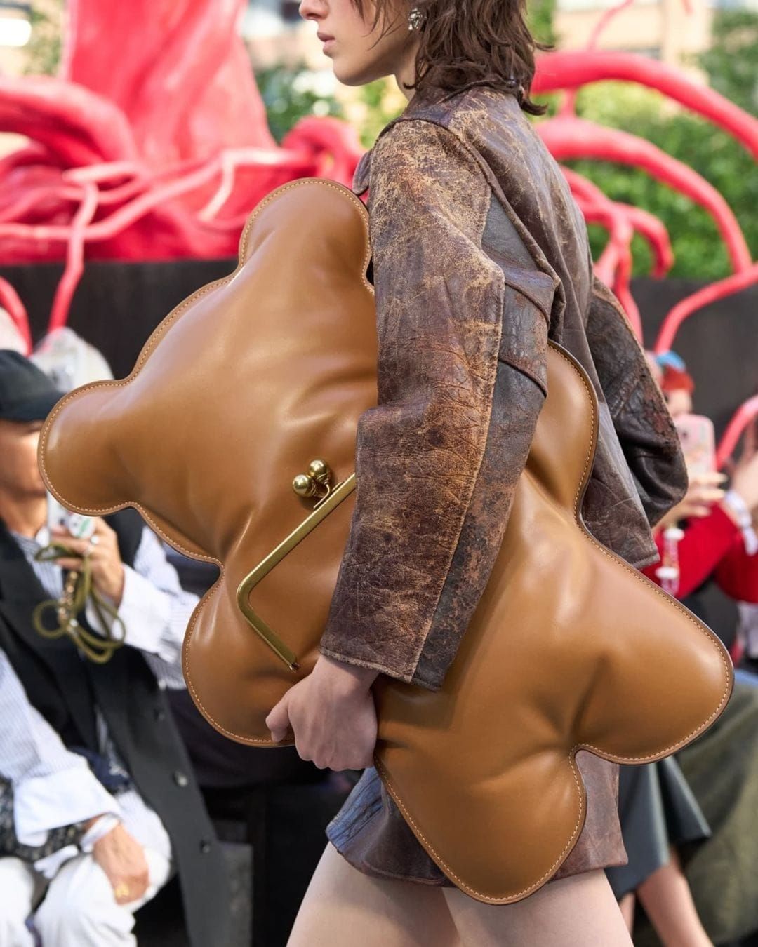 Coach Makes a Bold Statement at NYFW with Capacious Clutch Bags —YEET Magazine