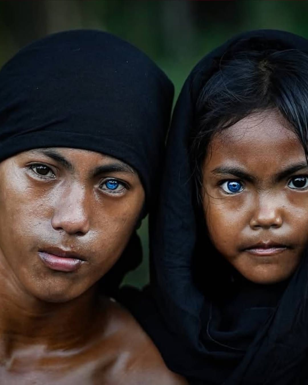 Indonesian photographer captures tribe with rare glowing blue eyes