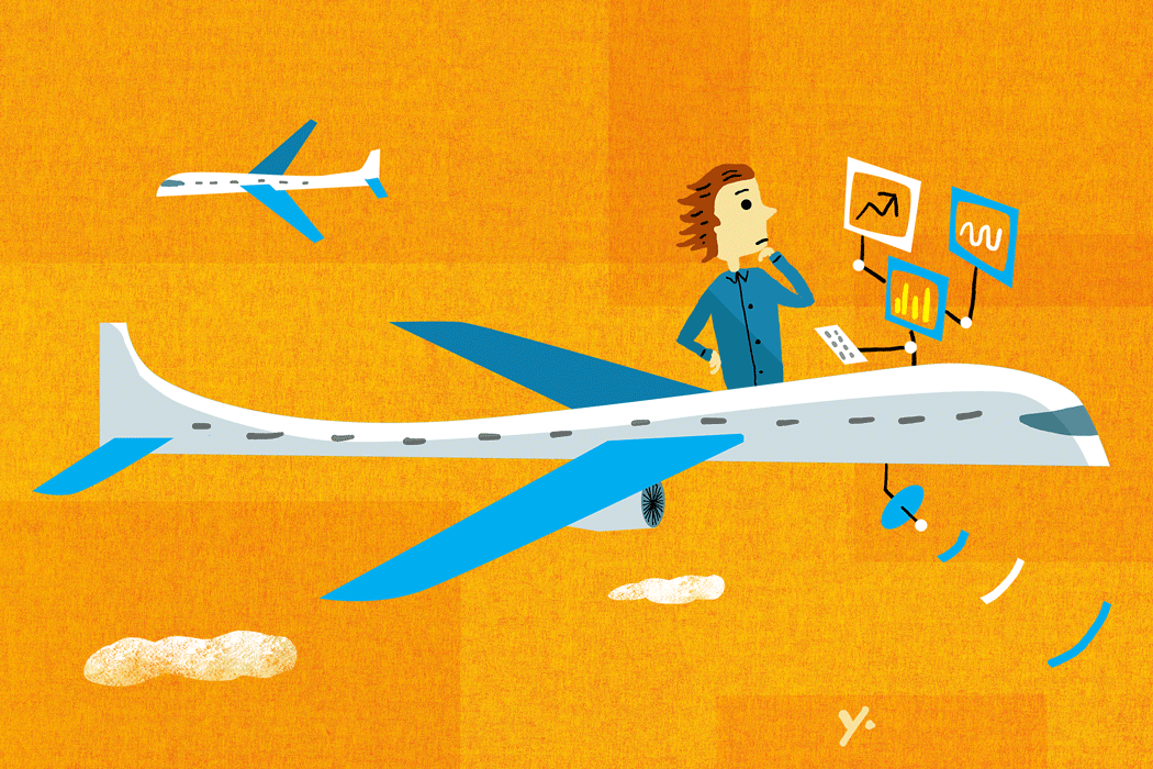 A person looking at a laptop screen showing a flight booking app with an AI price-drop alert notification.