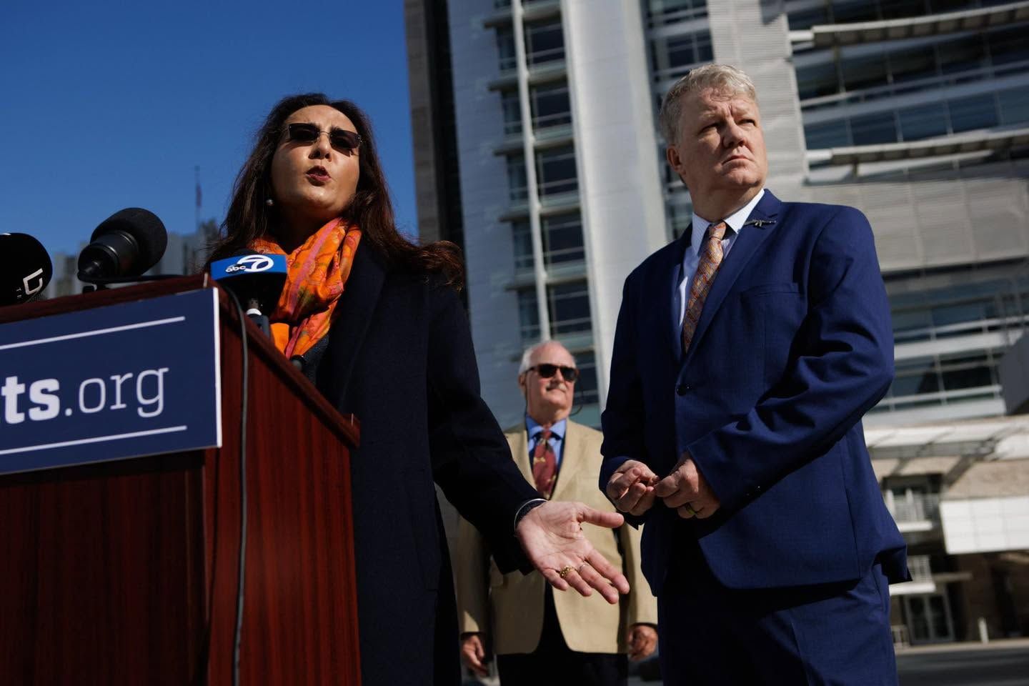 Harmeet Dhillon speaking during a legal event as searches rise for her voting letters investigation, DOJ lawsuit, election integrity case, and voter registration controversy.