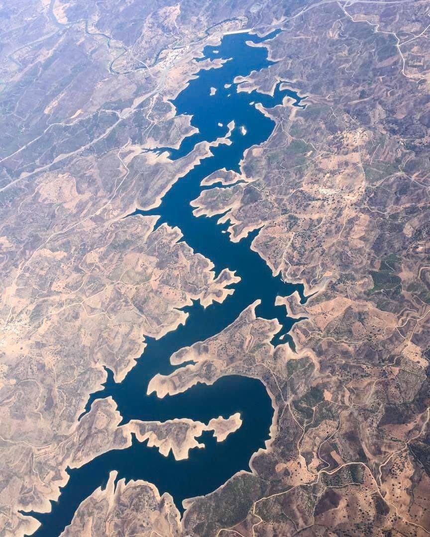 Aerial view of Odeleite River Portugal known as the Blue Dragon River.