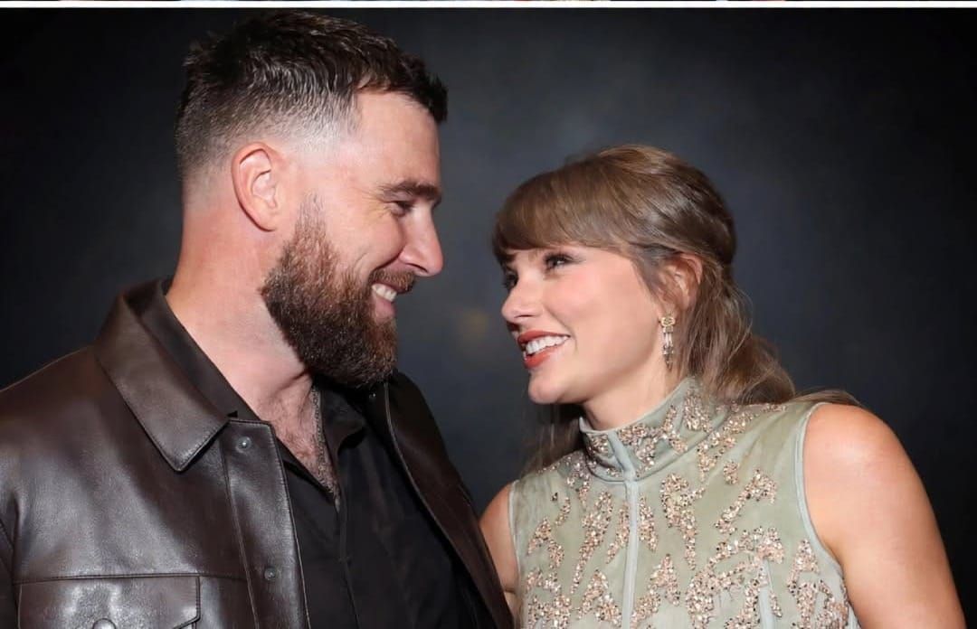 Taylor Swift and Travis Kelce at a public event following their $2 million food bank donation