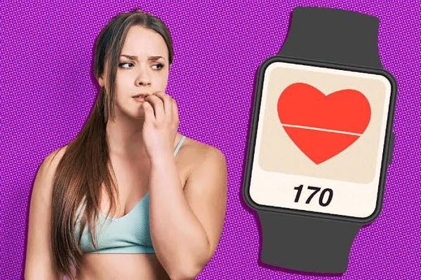 A close-up of a high-tech wearable device showing advanced biometrics and a digital overlay of a person's physiological health data.