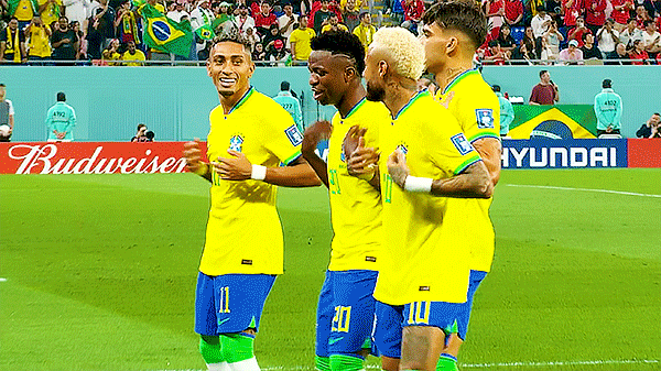 A split-screen showing a crowded stadium atmosphere on one side and a group of fans performing a viral dance challenge on the other during the 2026 FIFA World Cup.
