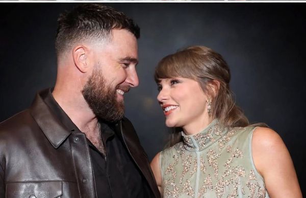 Taylor Swift and Travis Kelce at a public event following their $2 million food bank donation