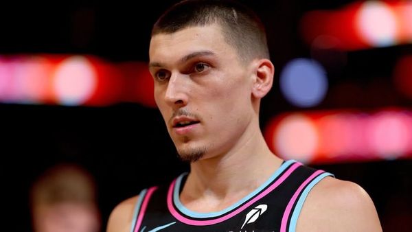 Tyler Herro wearing Miami Heat jersey during NBA game