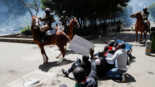 Kenyan police use tear gas during a demonstration against suspected kidnappings by the government.