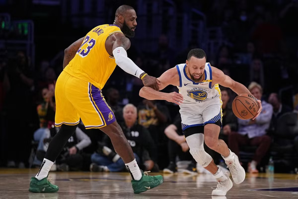 Curry Shines as Warriors Edge Lakers; Morant Lifts Grizzlies with Buzzer-Beater