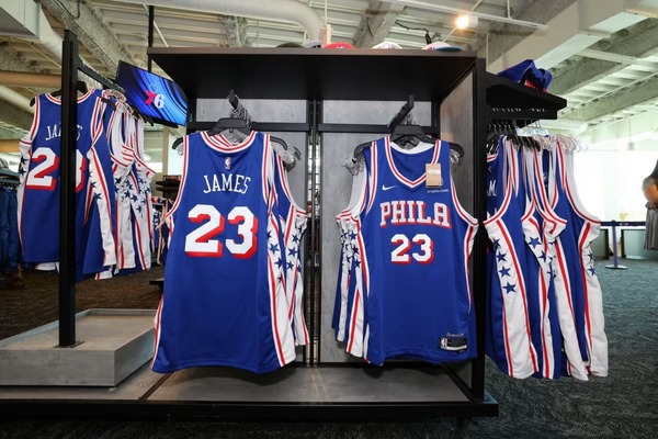 LeBron suits up in new jersey at Philadelphia 76ers media debut