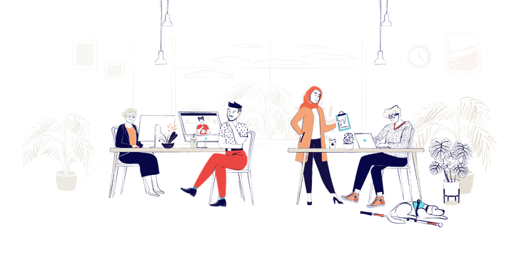 Four people in an office sitting around two desks. A service dog sits under one desk.