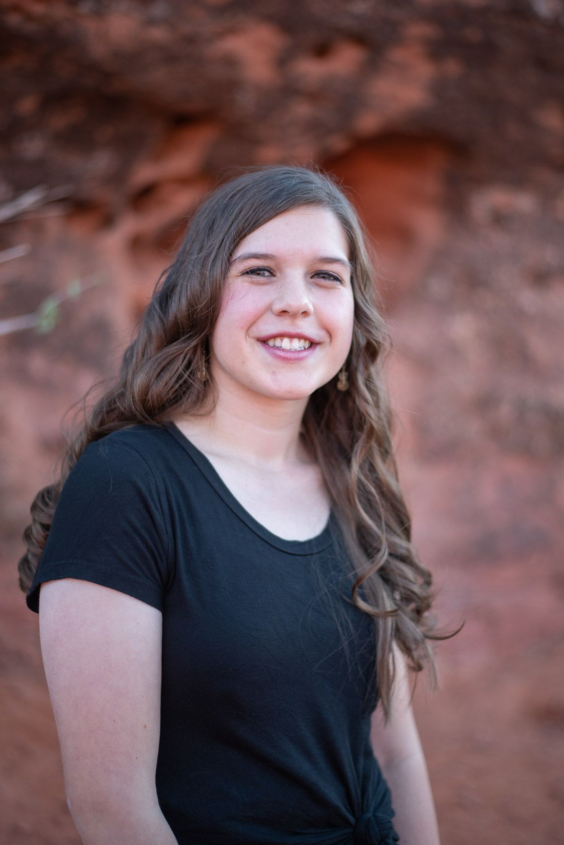 Teenage girl smiling at camera