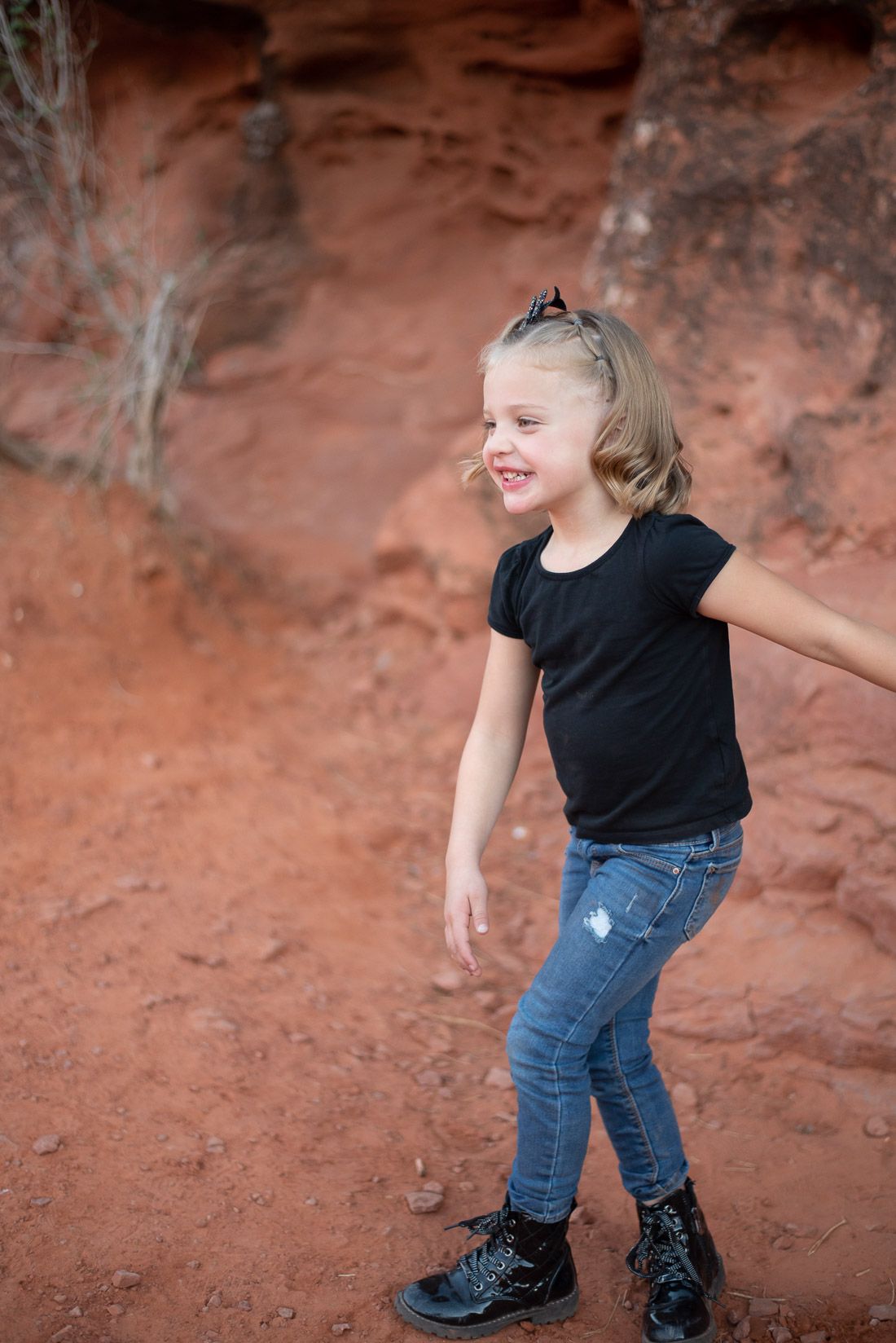 Young girl dancing and smiling