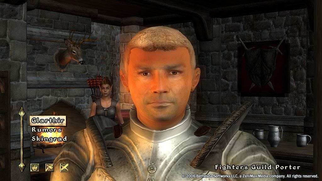An Oblivion NPC in shining armour looks at the player.
