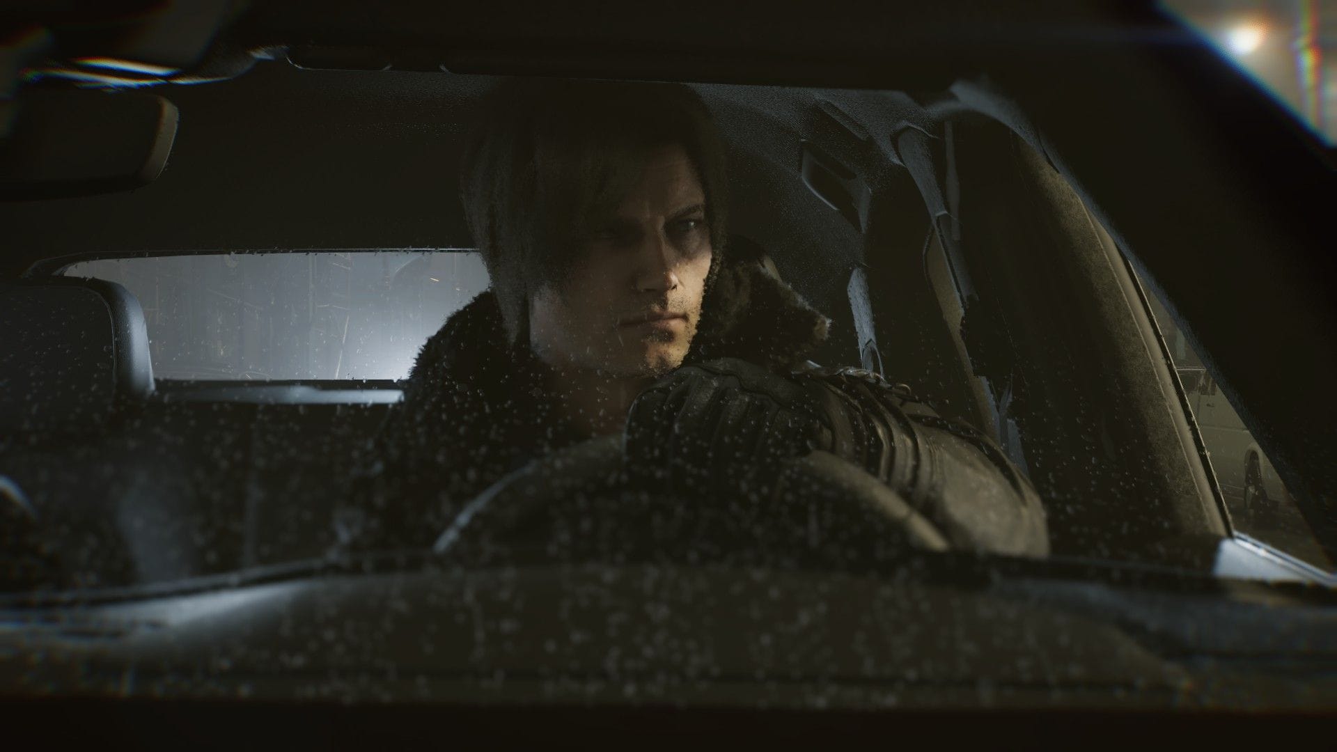 Leon Kennedy behind the wheel of his vehicle, a Porsche.