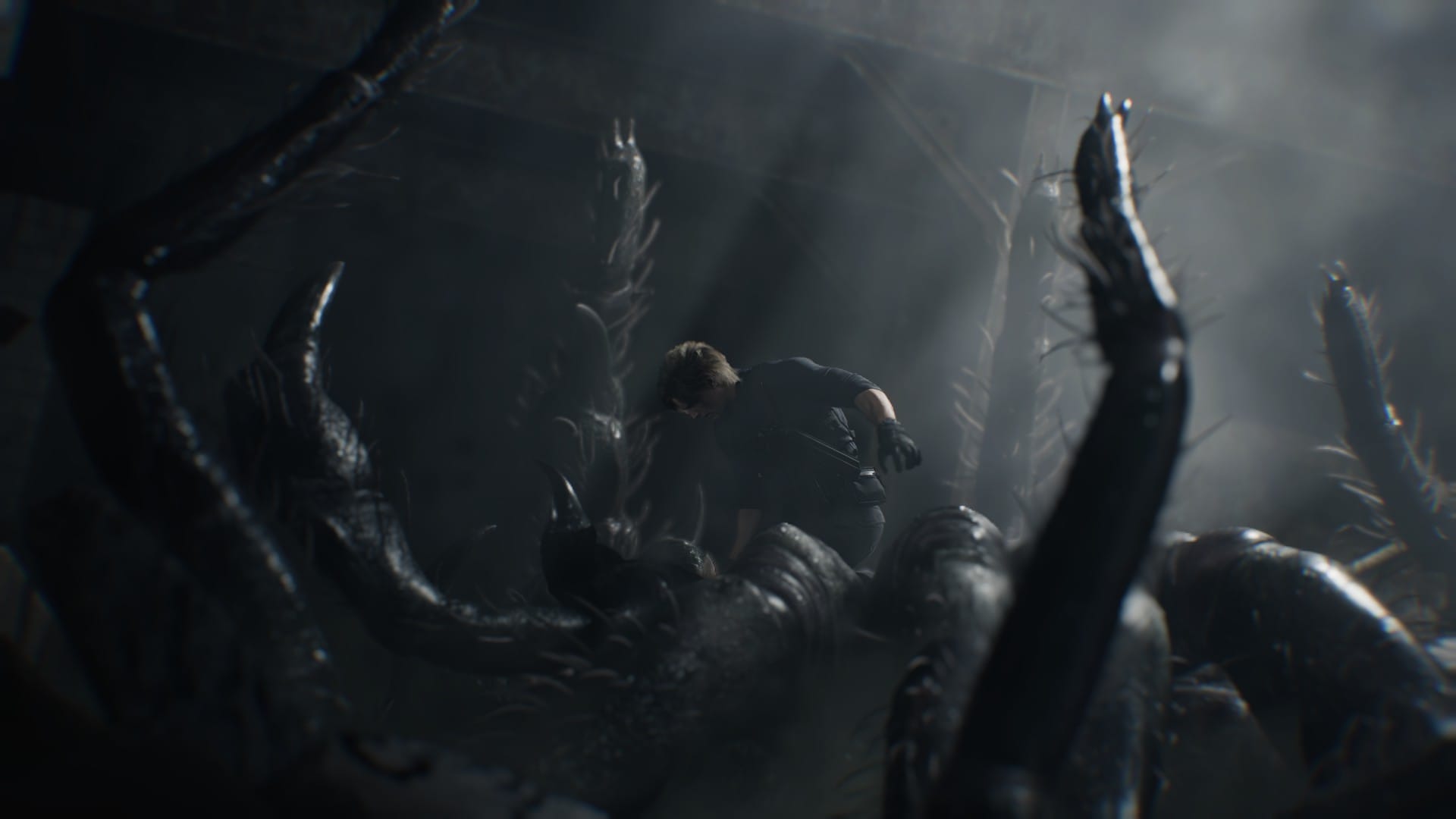 Leon buries his axe into a spider.