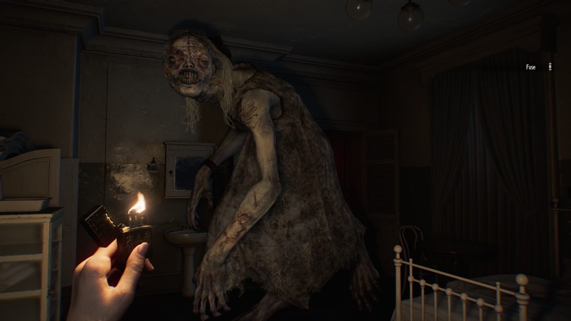 A large monster in a grey dress faces the player, who holds a lighter aloft.