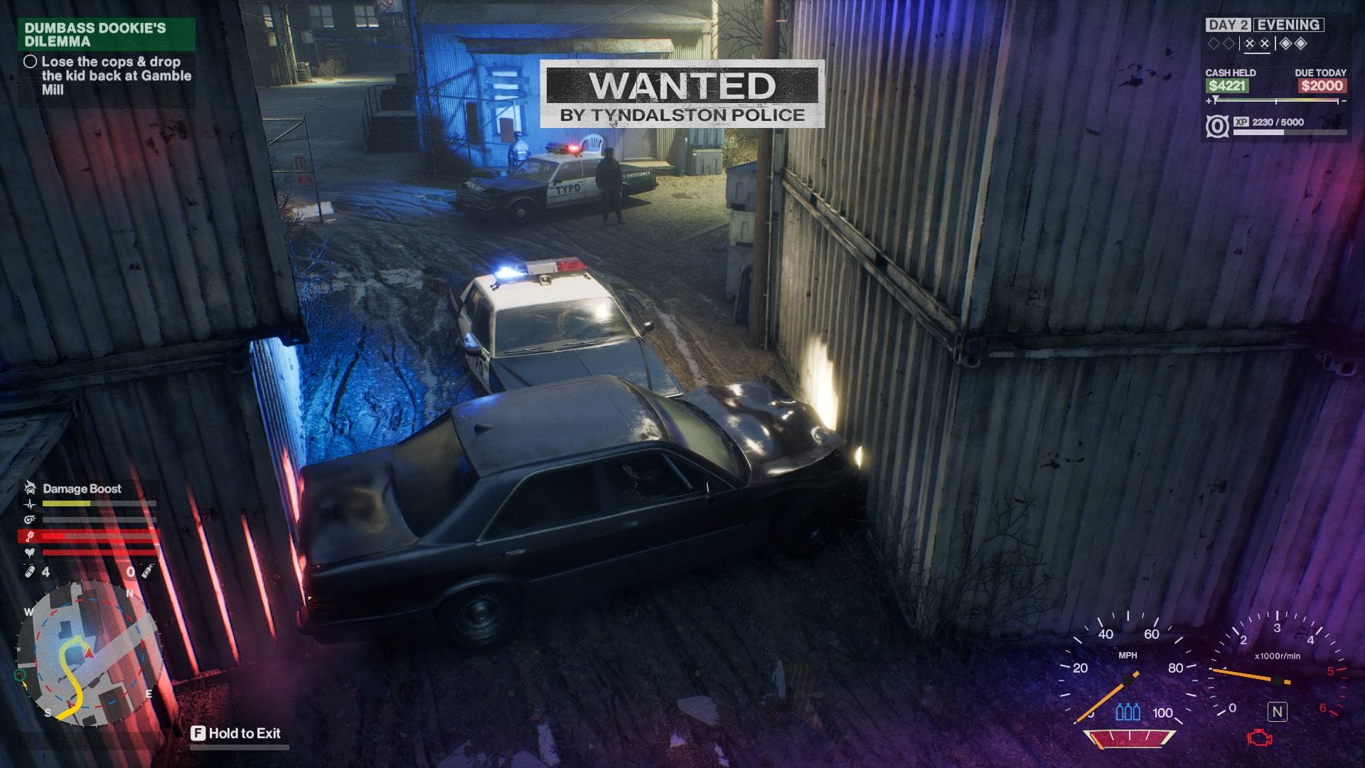 The player's car T-boned by a police car between two shipping containers, wedging it in place.