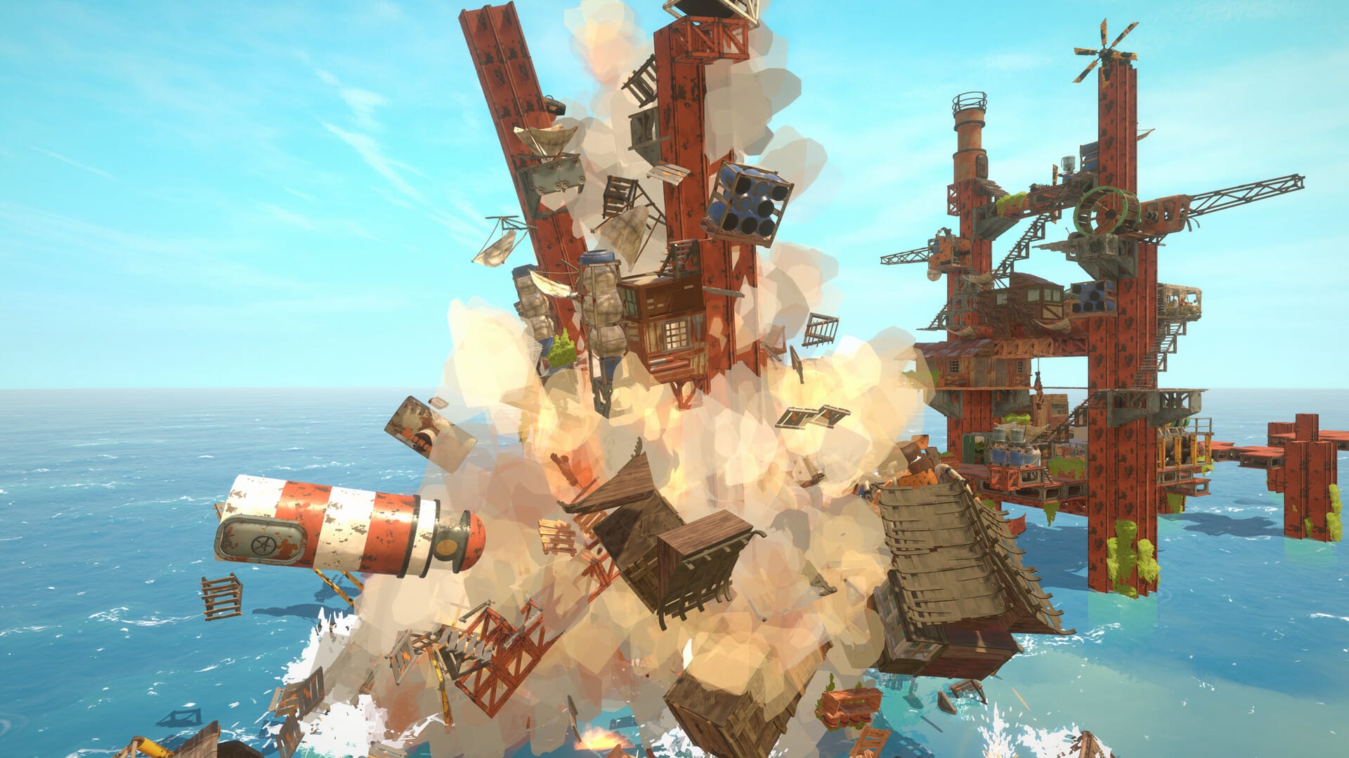 A tower of girders and makeshift platforms collapses into the ocean against blue skies.