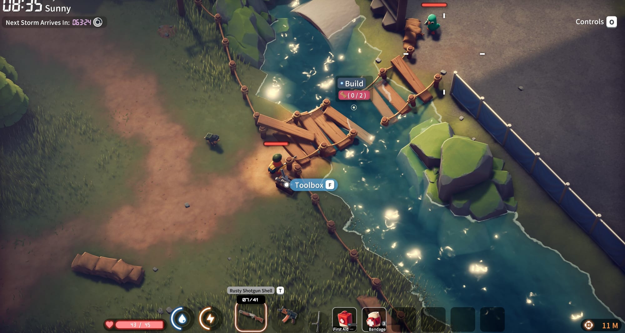 A top-down view of a green field and a river, with a broken bridge that can be repaired with a toolbox.