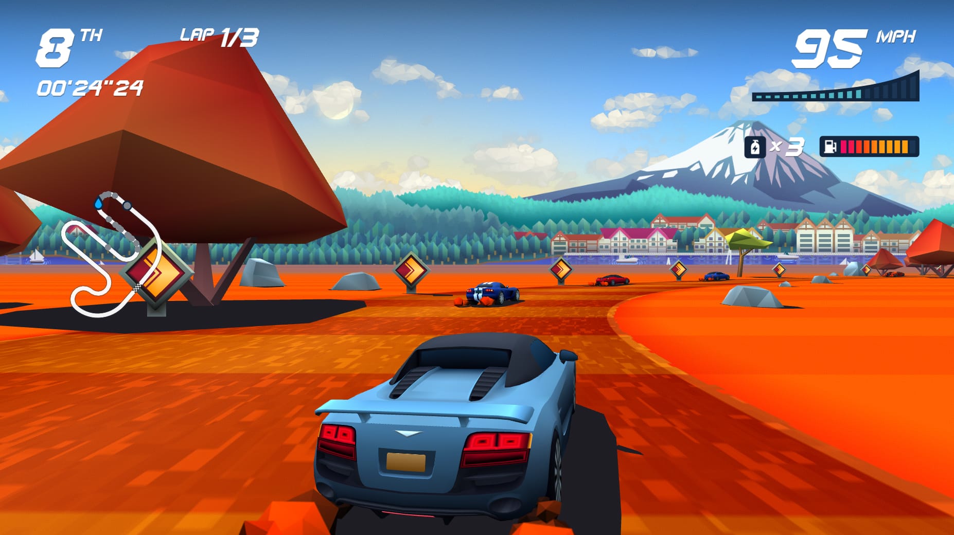A car speeds down a desert road. The road is striped, like a zebra crossing. There's a mountain in the distance.