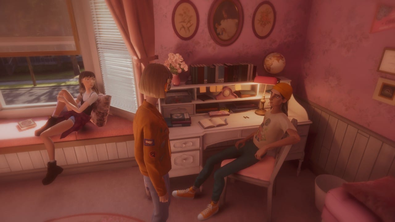 Stacey, Cass and Van lounge around an ornately decorated pink bedroom.