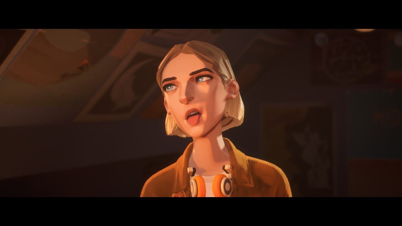 Stacey, pulling a face, her tongue slightly protruding, standing in a bedroom with posters behind her. Stacey has short hair and wears headphones around her neck.